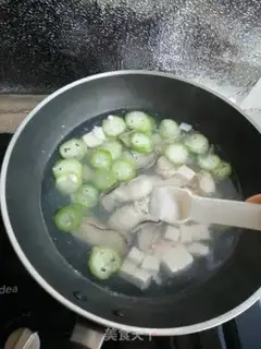 Make Seafood melon tofu soup step 10