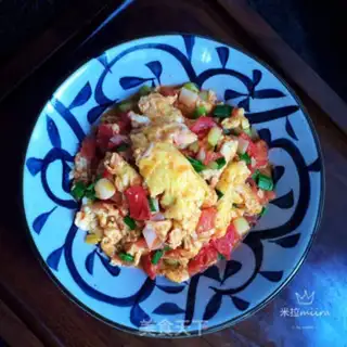 Make Garlic tomato fried eggs step 7