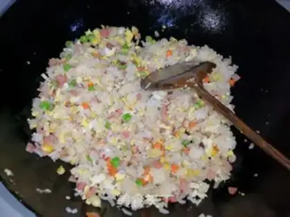 Make Corn pea ham and rice step 11