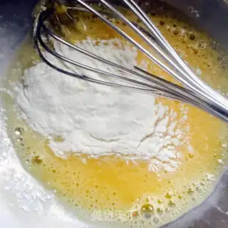 Make The cranberry marfin cake step 6