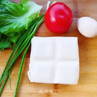 Make Tomato tofu egg soup step 0