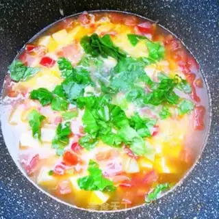 Make Tomato tofu egg soup step 9