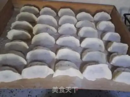 Make Pork carrot abalone mushroom dumplings step 20