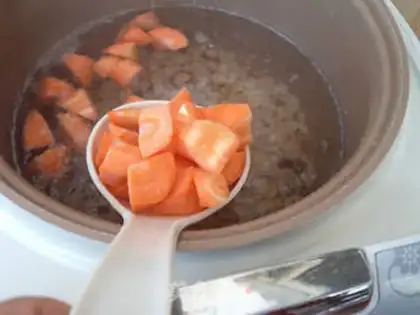 Make The greasy carrot, the rice porridge step 6