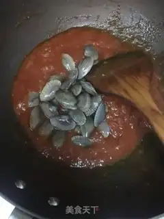 Make Seafood tomato pasta step 9