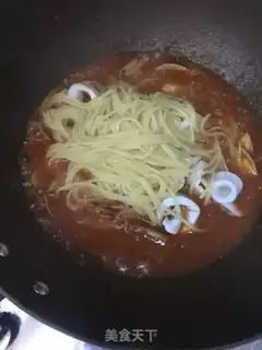 Make Seafood tomato pasta step 11