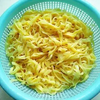 Make Hands on egg noodles step 11