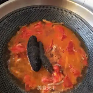 Make Sea cucumber silk tomato egg noodles step 8