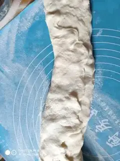 Make Baked sausage sesame rolls step 5