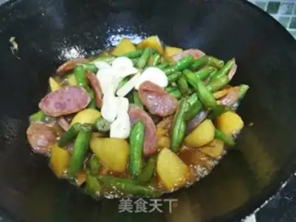 Make Sausage fried potatoes and beans step 10