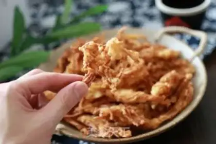 Make Soft-fried golden mushrooms step 7