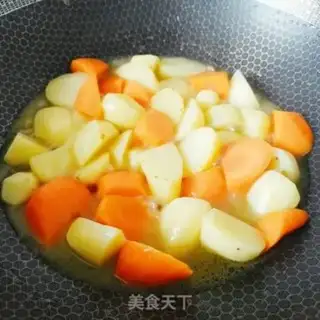 Make Cow roast potatoes and carrots step 12