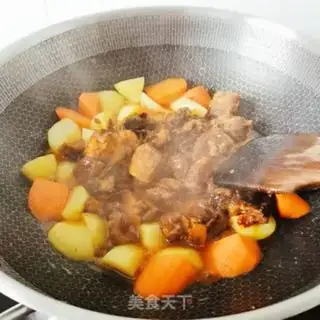 Make Cow roast potatoes and carrots step 14