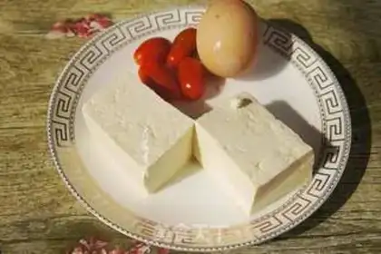 Make Tomato tofu egg soup step 0