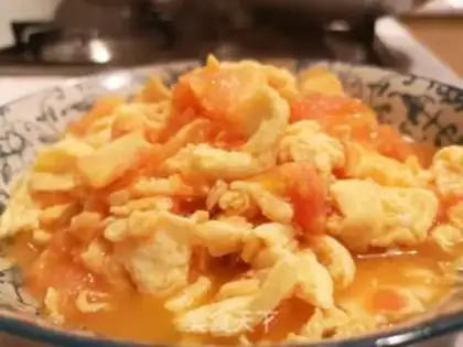 Make Tomato fried eggs step 9