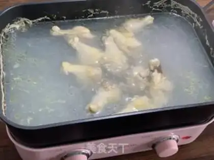 Make Chicken wings and potatoes step 1