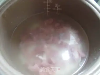 Make The rice porridge in the seafood mushrooms step 3
