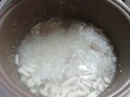 Make The rice porridge in the seafood mushrooms step 10