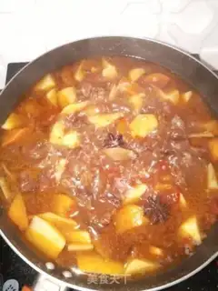 Make Tomato beef stew potatoes step 8