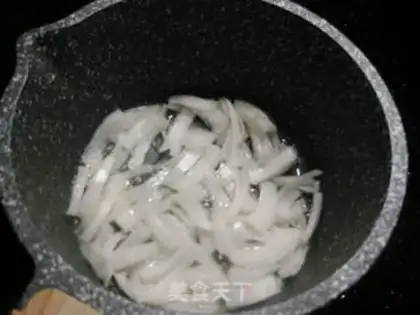 Make A dry pot with mushrooms and chicken ears step 10
