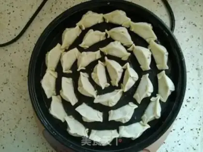 Make Three fried dumplings carrying eggs step 6