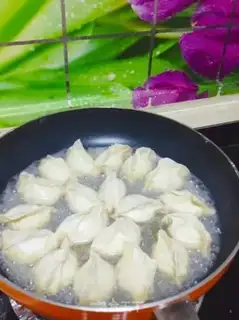 Make Fish fried dumplings step 16