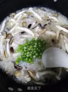 Make Chicken-swiss beans and mushroom congee step 13