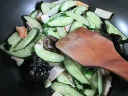 Make Black mollusk tofu cucumber step 5