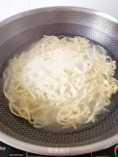 Make Egg milk hand noodles step 11