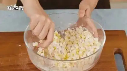Make Egg yolk corn step 1