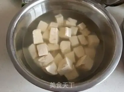 Make The cabbage curry is frozen tofu step 0