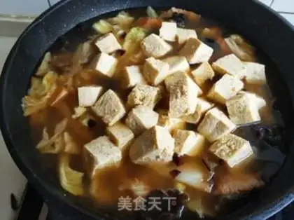 Make The cabbage curry is frozen tofu step 15
