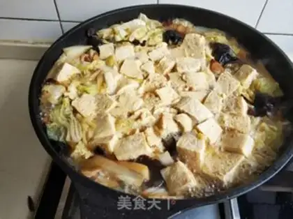 Make The cabbage curry is frozen tofu step 16