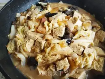 Make The cabbage curry is frozen tofu step 17