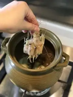 Make Chouzhou cuisine congee step 10