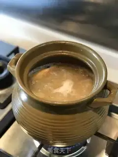 Make Chouzhou cuisine congee step 17