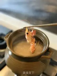 Make Chouzhou cuisine congee step 18