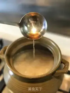 Make Chouzhou cuisine congee step 20