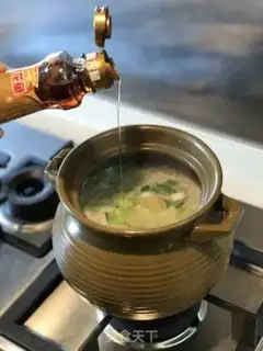 Make Chouzhou cuisine congee step 25