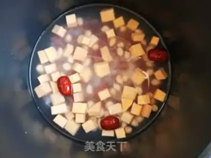 Make Potato peanut rice congee step 6