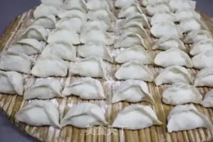 Make Old duck chili fan dumplings step 11