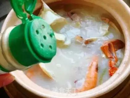 Make Seafood crab porridge step 10