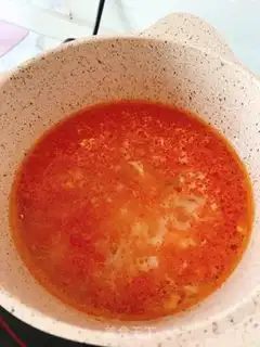 Make Tomato fish porridge step 5