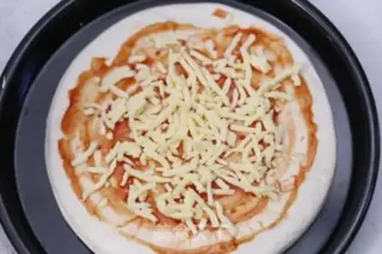 Make Eight inches of regular pizza step 0