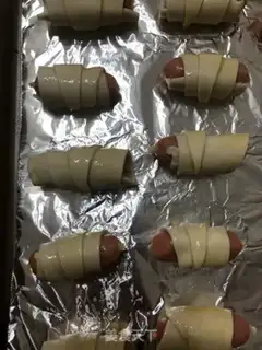 Make Hands on the burrito sausage step 4