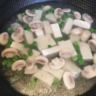 Make Spoon mushroom tofu soup step 2