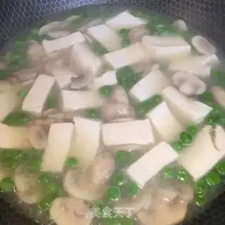 Make Spoon mushroom tofu soup step 4