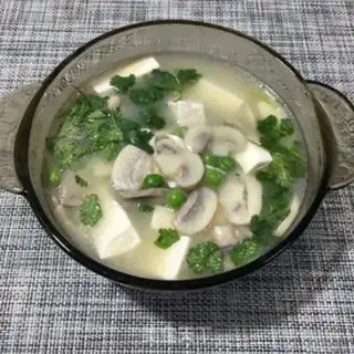 Make Spoon mushroom tofu soup step 6