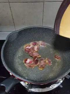 Make Onion fried sausage step 2