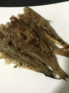 Make Dry-fried yellow flowers step 13